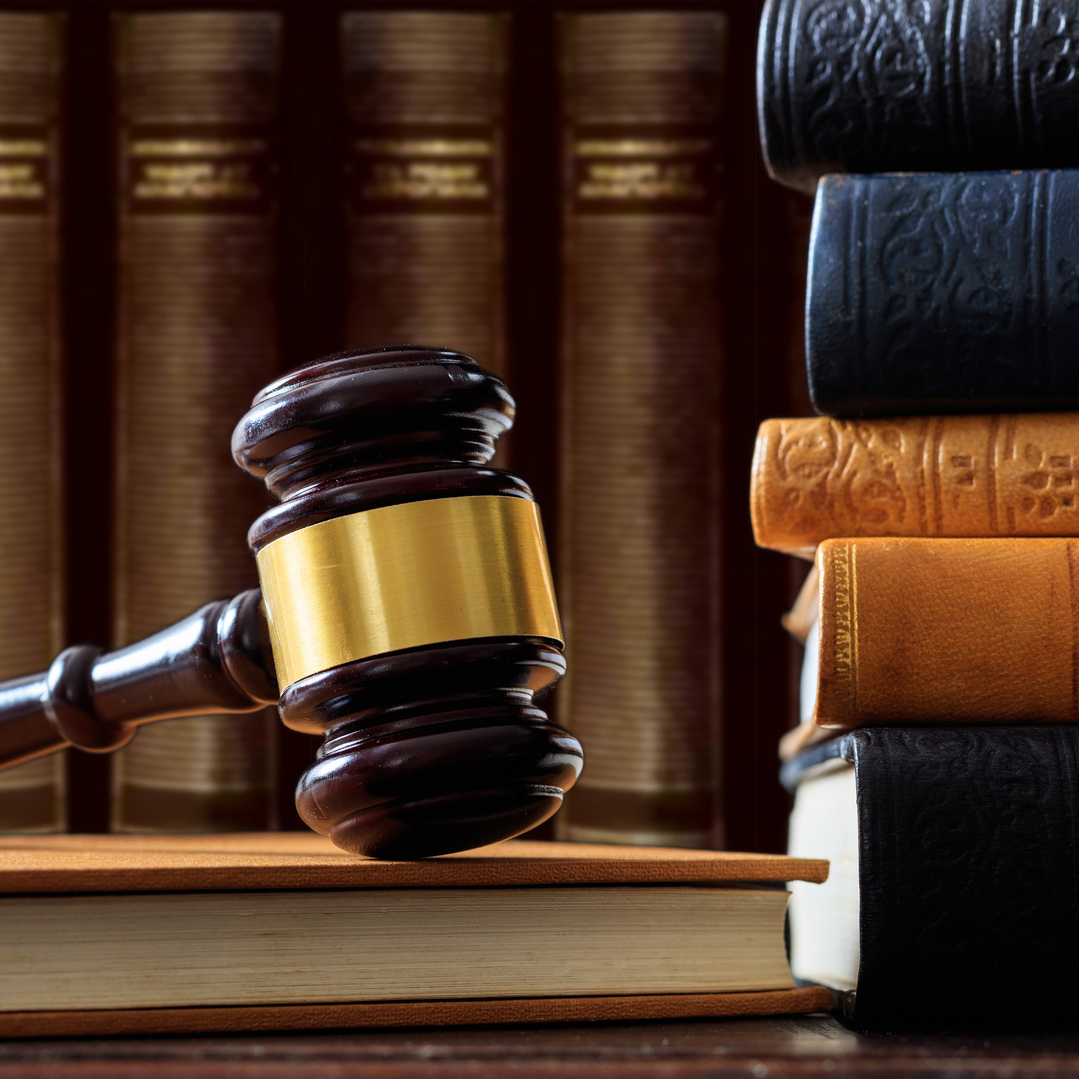 Law books and a gavel